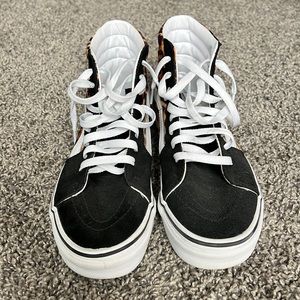 Women’s High Top black suede and cheetah print vans. Only worn a few times!
